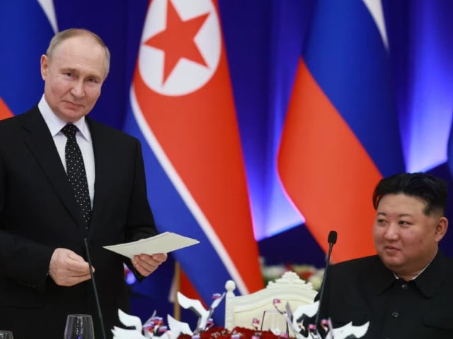 russia s president vladimir putin and north korea s leader kim jong un attend a state reception in pyongyang north korea june 19 2024 sputnik vladimir smirnov photo reuters